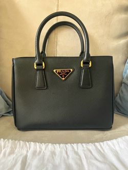 Small black leather bag