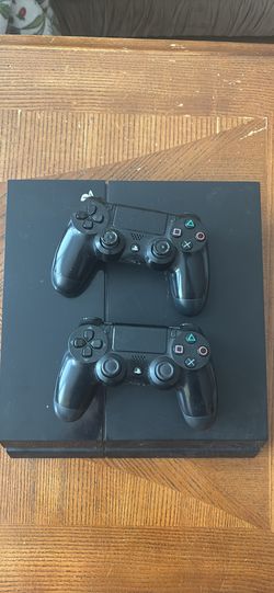 PS4 With 2 Black Controllers