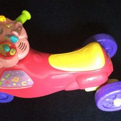 Vetch Learning motorbike-makes sounds and buttons light up