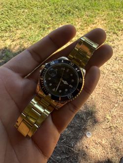 Rolex gold watch