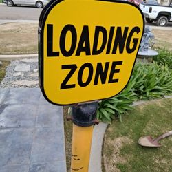VINTAGE PORCELAIN "LOADING ZONE " PARKING SIGN AND STAND....asking $120.00