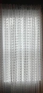 8 panels for 4 windows-NEW. Beautiful/chic 54x84 white sheer curtains with detailed pom-poms