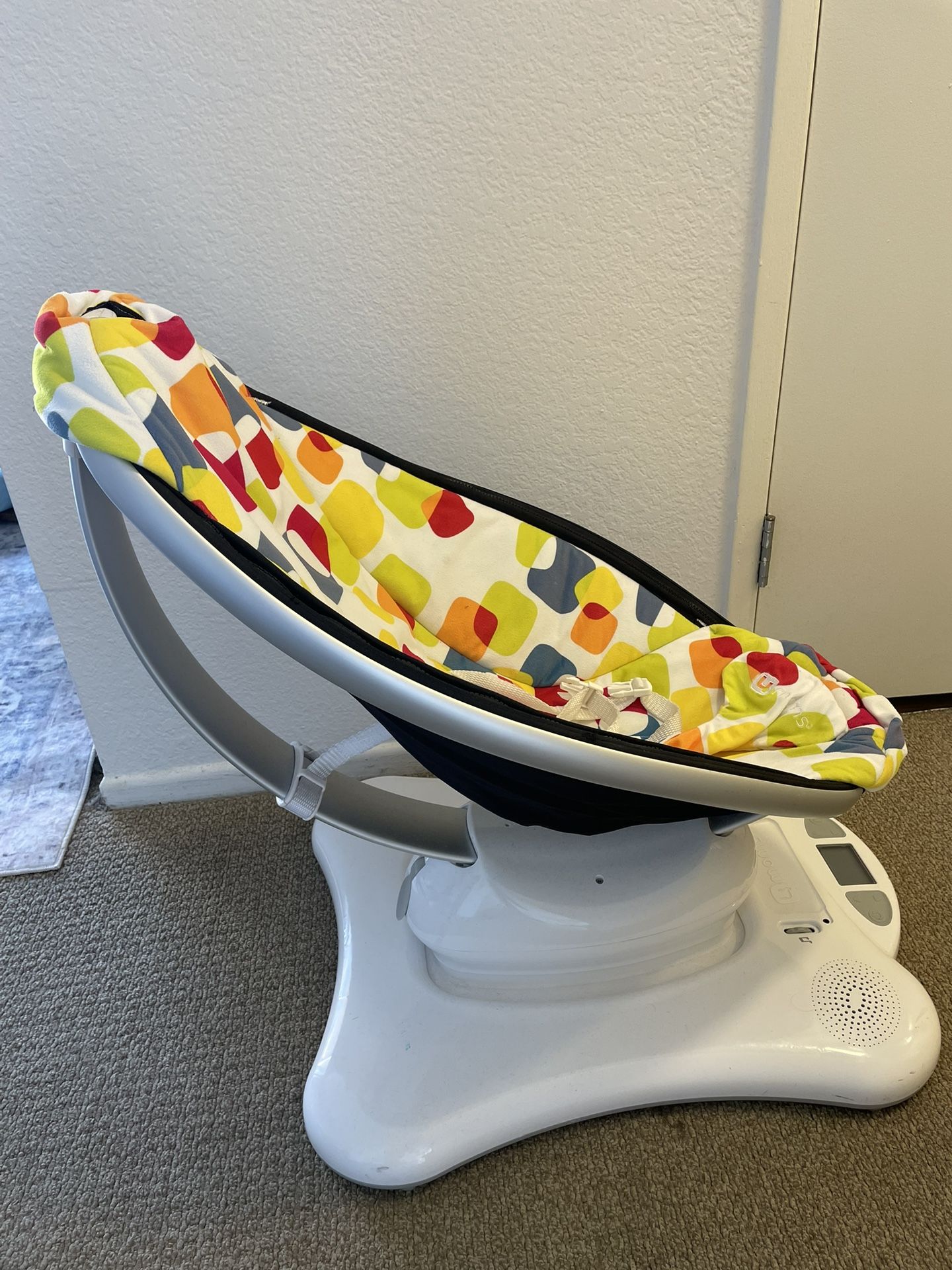 4moms MamaRoo infant swing and rocker.