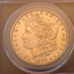 1886 Morgan Silver Dollar ANACS AU50  -  Genuine 