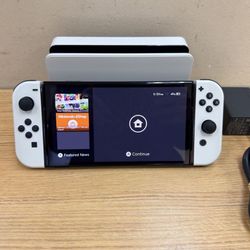 NINTENDO SWITCH OLED CHARGER/HDMI CORDS & TV DOCK INCLUDED
