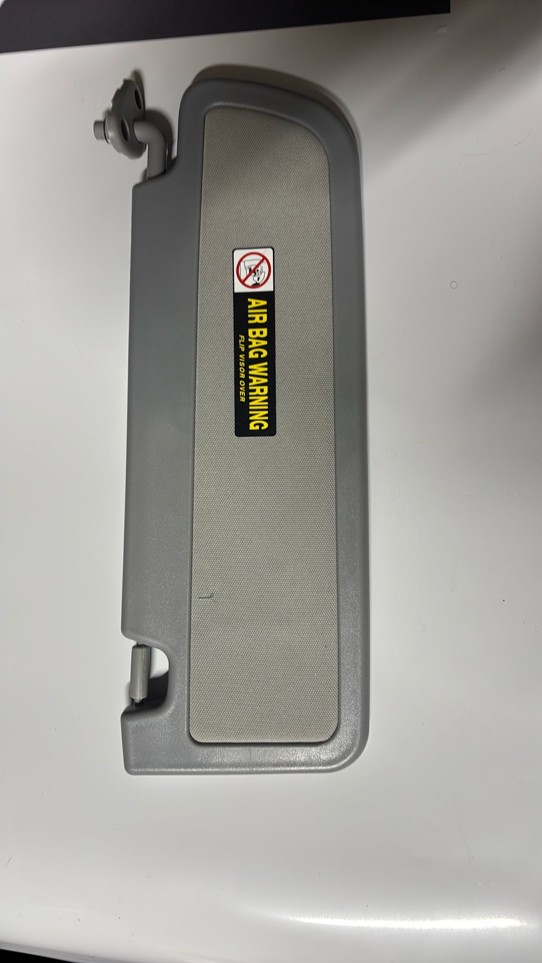 Left side driver sunvisor