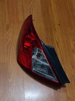 OEM 2012 - 2019 Nissan Versa Sedan Left Taillight Assembly (Bulbs Included)