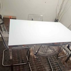 White Glass Dining Room Table And Four Acrylic Chairs For Sale