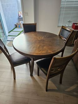 Round kitchen table with 6 chairs