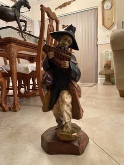 Old wood man sculpture