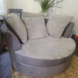 Swivel round sofa/couch