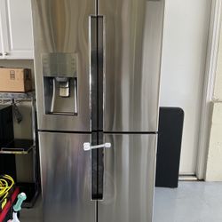 Samsung 4 Door Refrigerator In Stainless Steel.