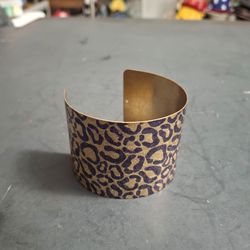 Leopard Print Open Ended Cuff Bracelet Featuring 2" Wide Metallic Gilded Goldtone Brass Body W/Dark Purple Leopard Print