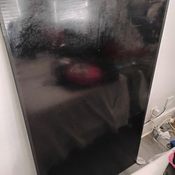 A 65" Inch Samsung Smart T.V. 