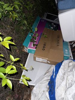 Empty box for Hisense 55-inch TV, empty long, flat Target box, and Smaller Long, Flat Box.