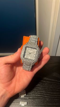 Iced out Cartier watch