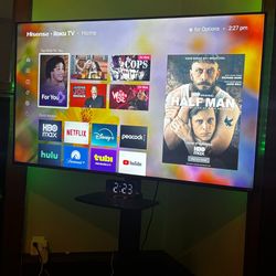 58’ Tv with mounted tv stand