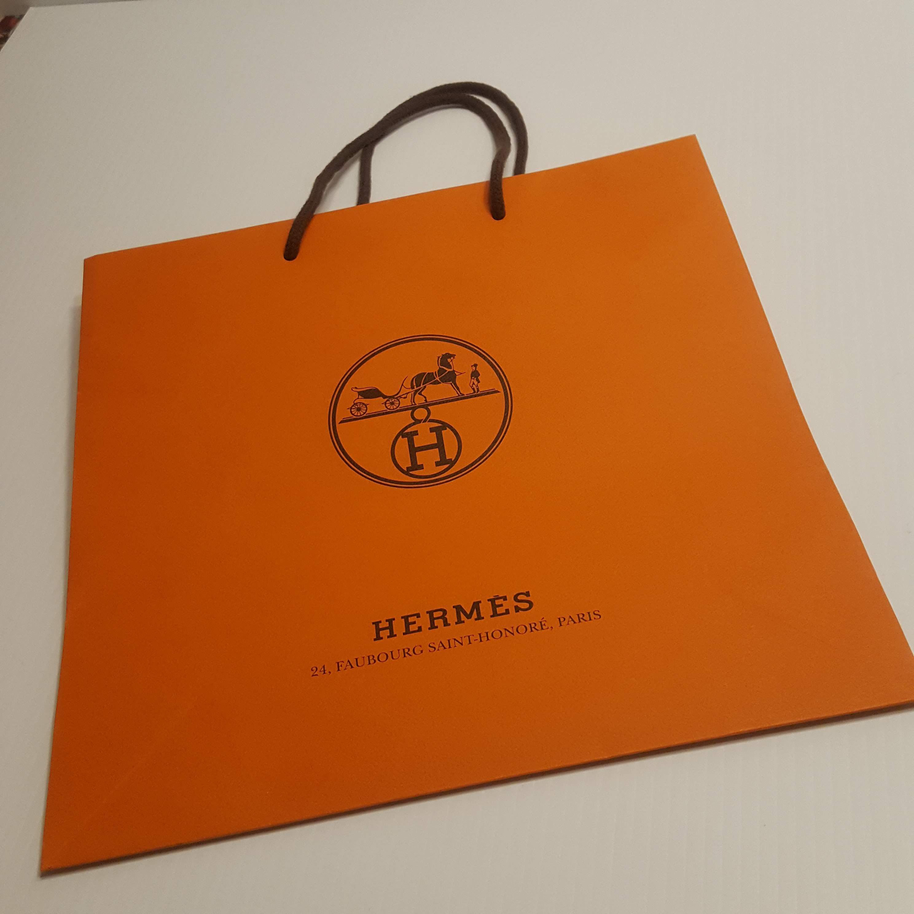 Hermes Orange Shopping Gift Paper Bags Medium size. Perfect shape. Size 11 ¾” x 11 ¾”.