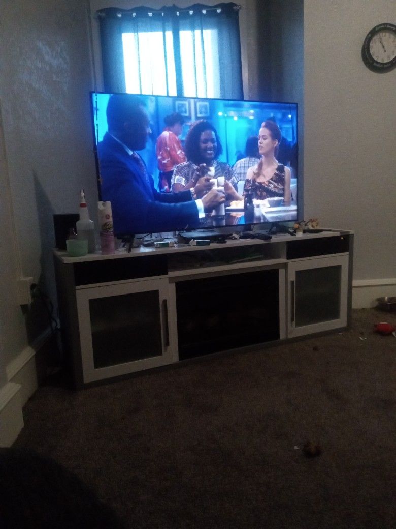55"T.V With Entertainment Center, Built In To It
