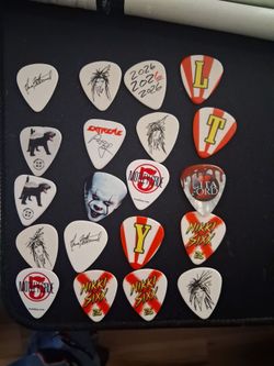 20 Guitar Picks from Motley Crue & Extreme & Tommy Lee's stage sticks