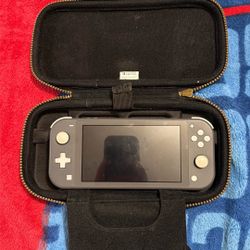 Nintendo Switch Lite (Gray) – 64GB SD Card Included