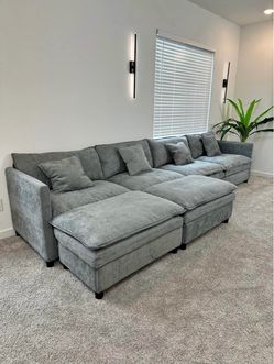 Brand new sectional with ottoman
