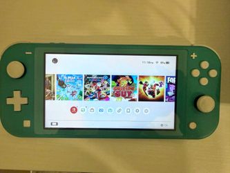 Nintendo Switch Lite (Black Protection Case Included)