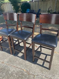 Nice 3 leather height chairs ( 24 inch height