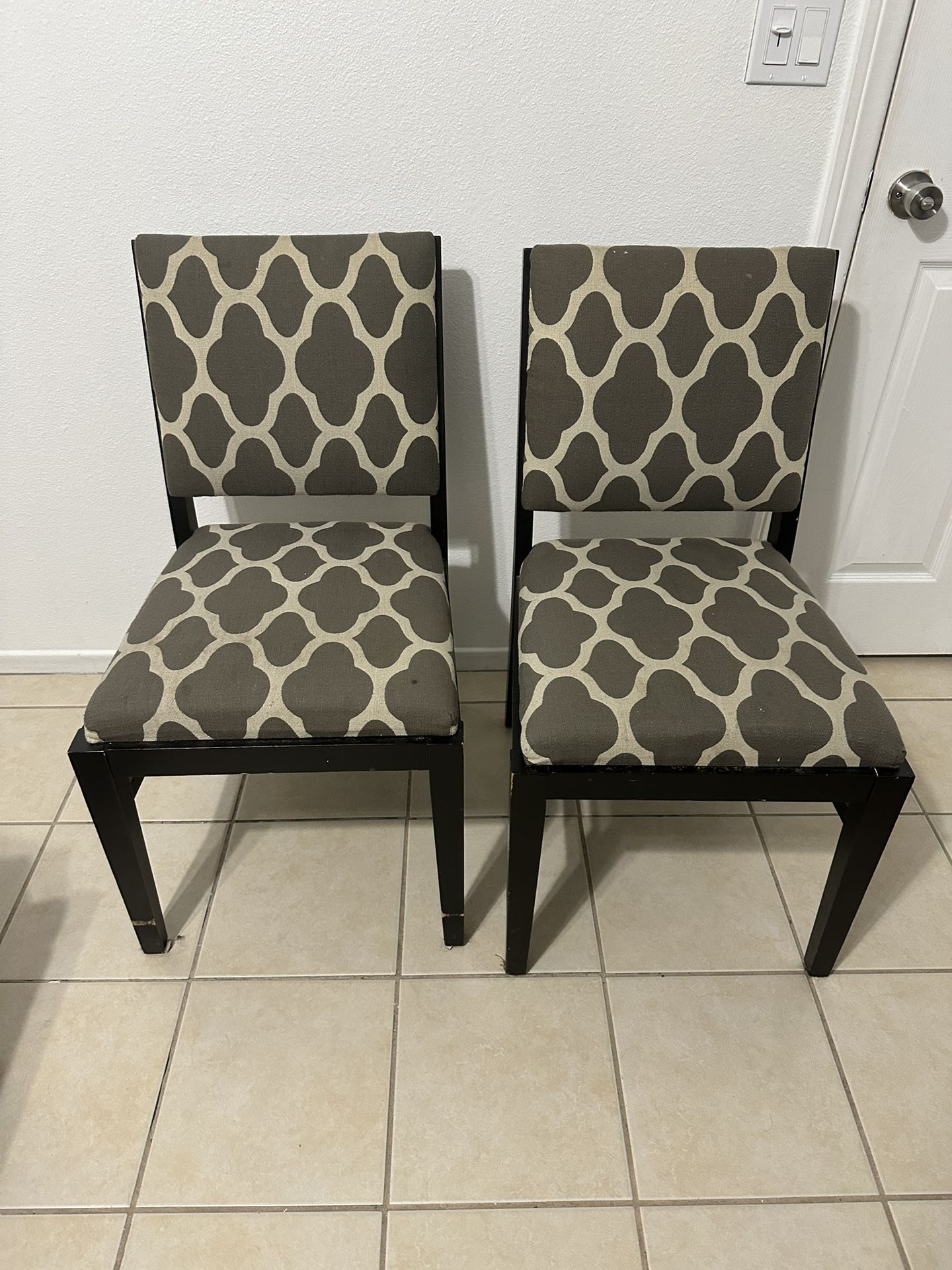 Two Gray And White Dining Room Chairs