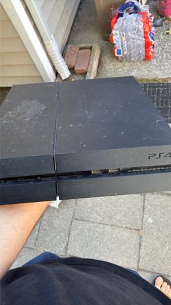 PlayStation 4 with no controllers and cables as well as games