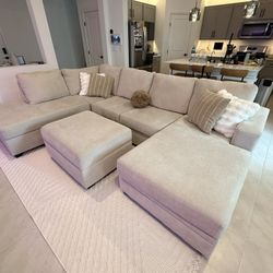 Living Spaces Bonaterra II Sand 127" 2 Piece Sectional with Ottoman