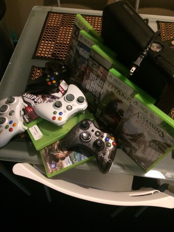 Xbox 360 with games and controllers
