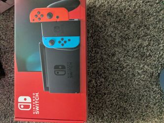 Nintendo Switch Console Neon Red/Blue and a grey/black one