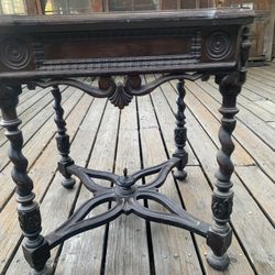 Heavily carved walnut game, Table