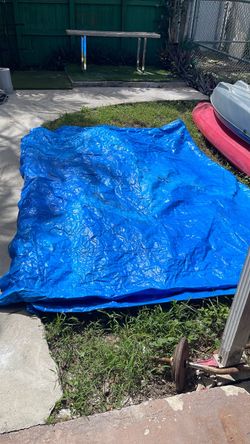 Free Tarp ( has tear) Free