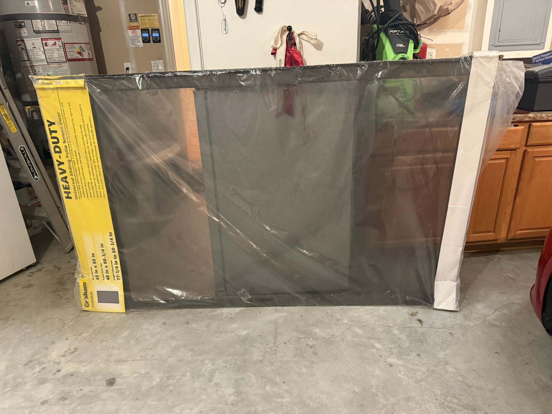 New still in packaging: Grisham Heavy-Duty Universal Sliding Patio Screen Door 48 in x 80 in