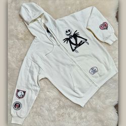 Disney The Nightmare Before Christmas Jack Skellington zip-up hoodie with embroidered patches Women's Size SMALL- Ivory Color 💀✨️