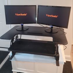 VIVO STANDING DESK CONVERTER IN EXCELLENT  CONDITION. IT ADJUST TO DIFFERENT HIGH POSITIONS.  GREAT FOR WORK, HOME OR SCHOOL. $70.00 OR BEST OFFER. 