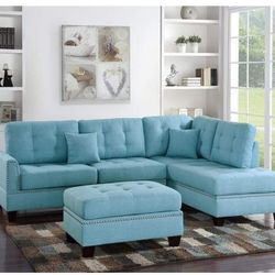 Brand New Blue Sectional And Ottoman 