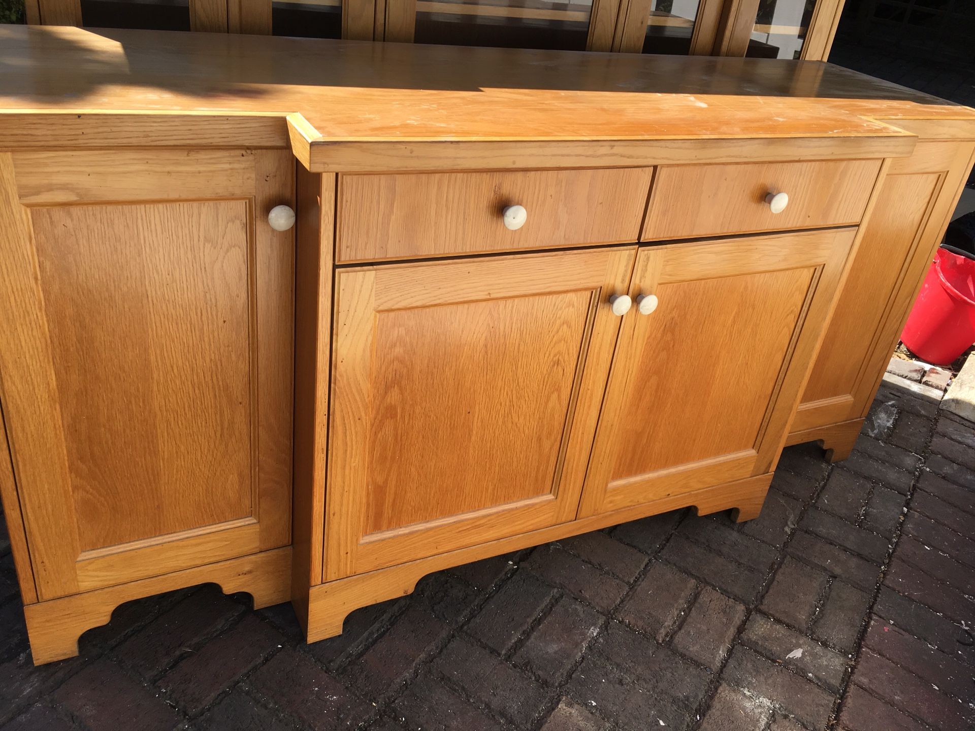 Free buffet hutch- 2 pieces, look at both pics, item in driveway