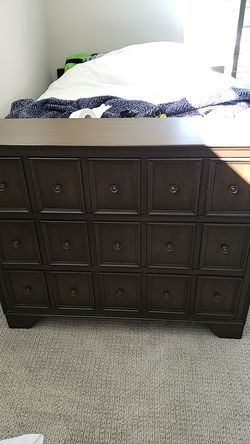 Brown stand with drawers
