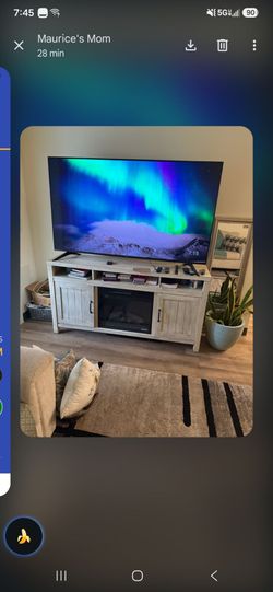 75 in TV and fireplace