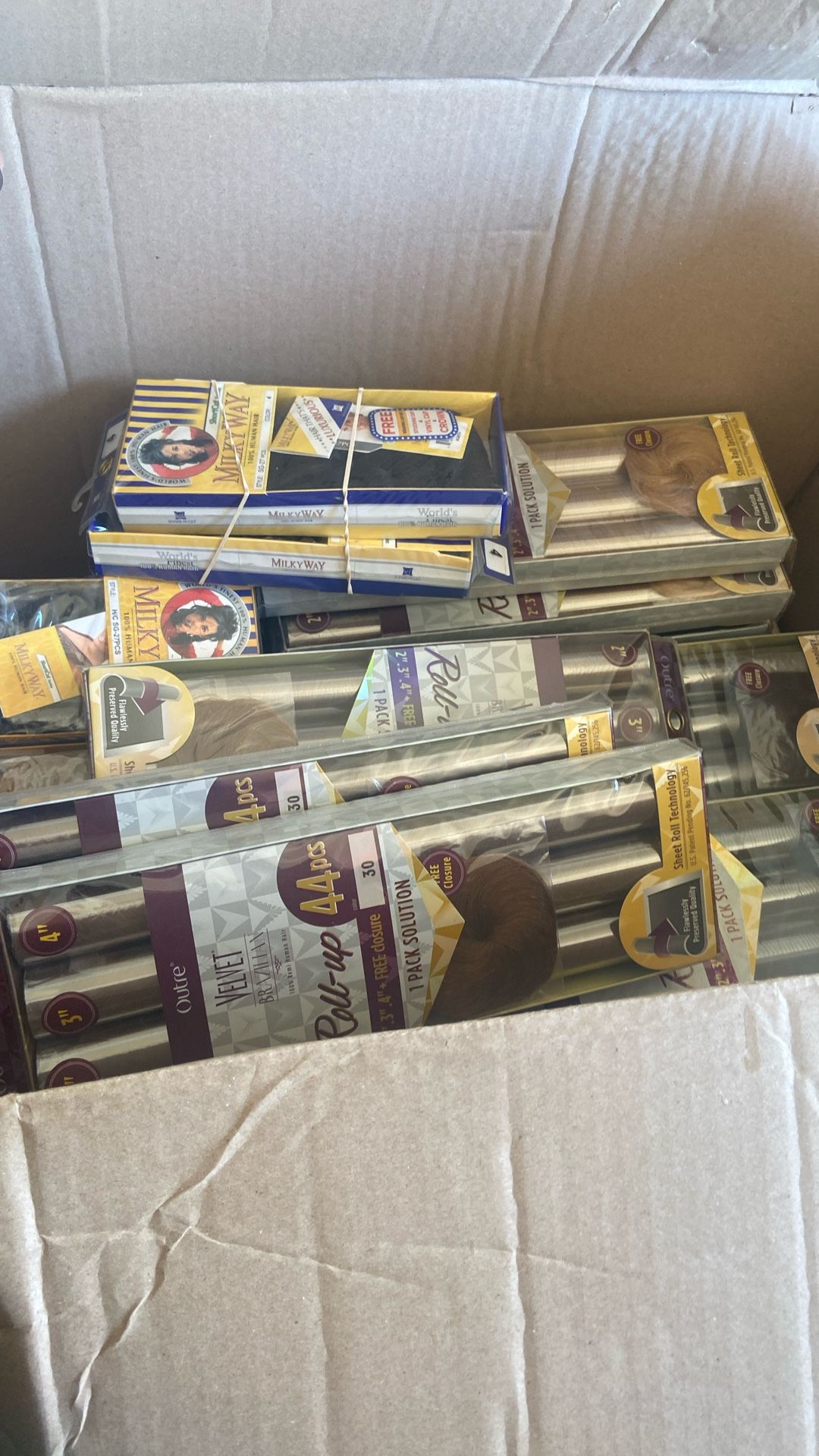 Human hair, 44 piece And 27 piece Outre & Milky Way beauty supply liquidation
