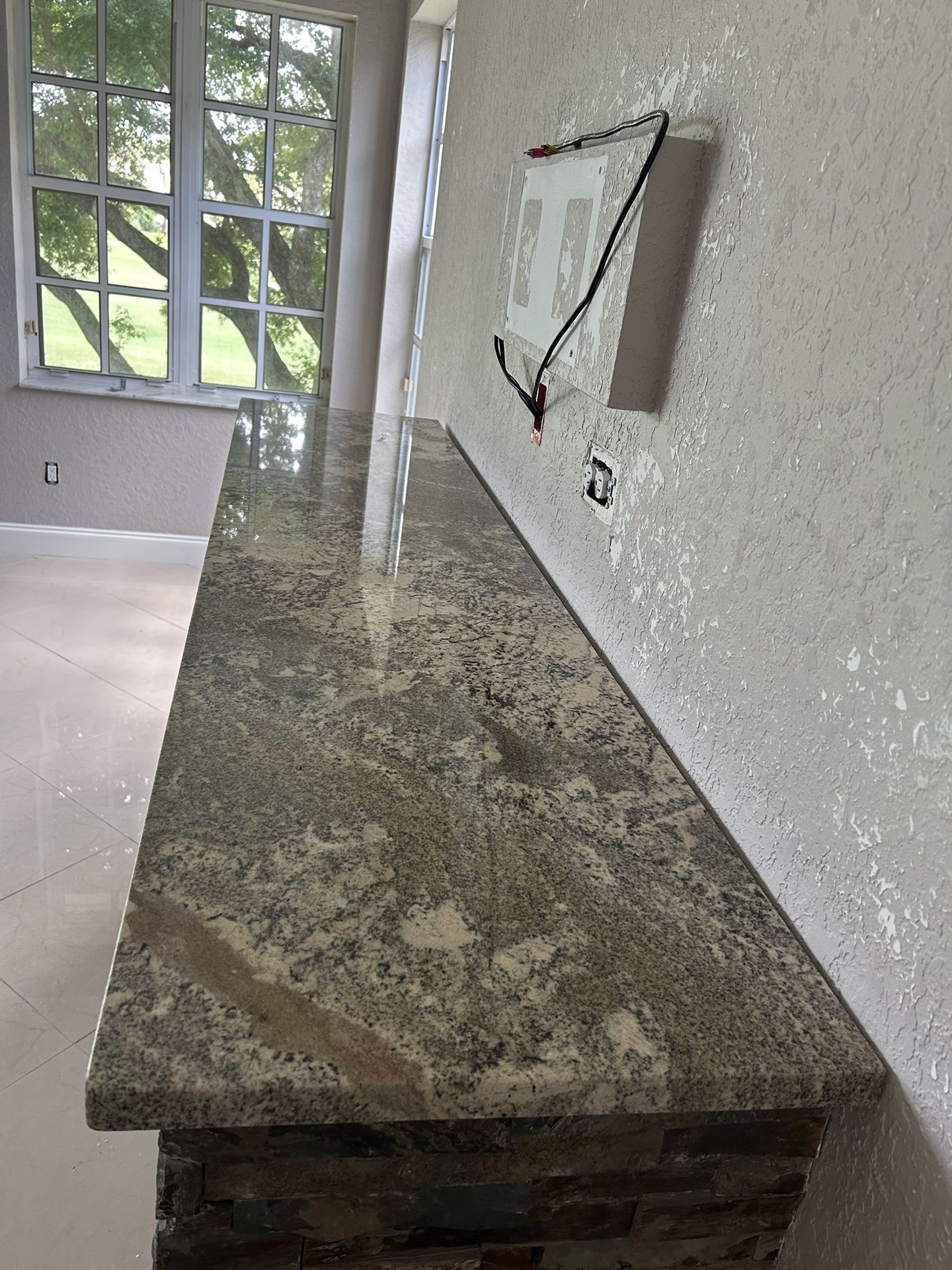 1 1/2β thick slab of granite