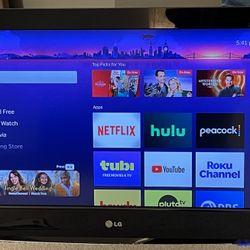 32” LG LCD TV w/Roku Express & Wall Mount