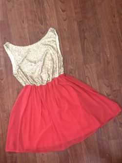 gold sequin and coral red dress