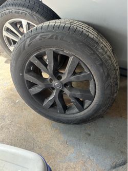 Nissan rim and tire 235/65R18