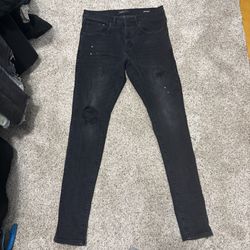 One knee rip purple jeans 