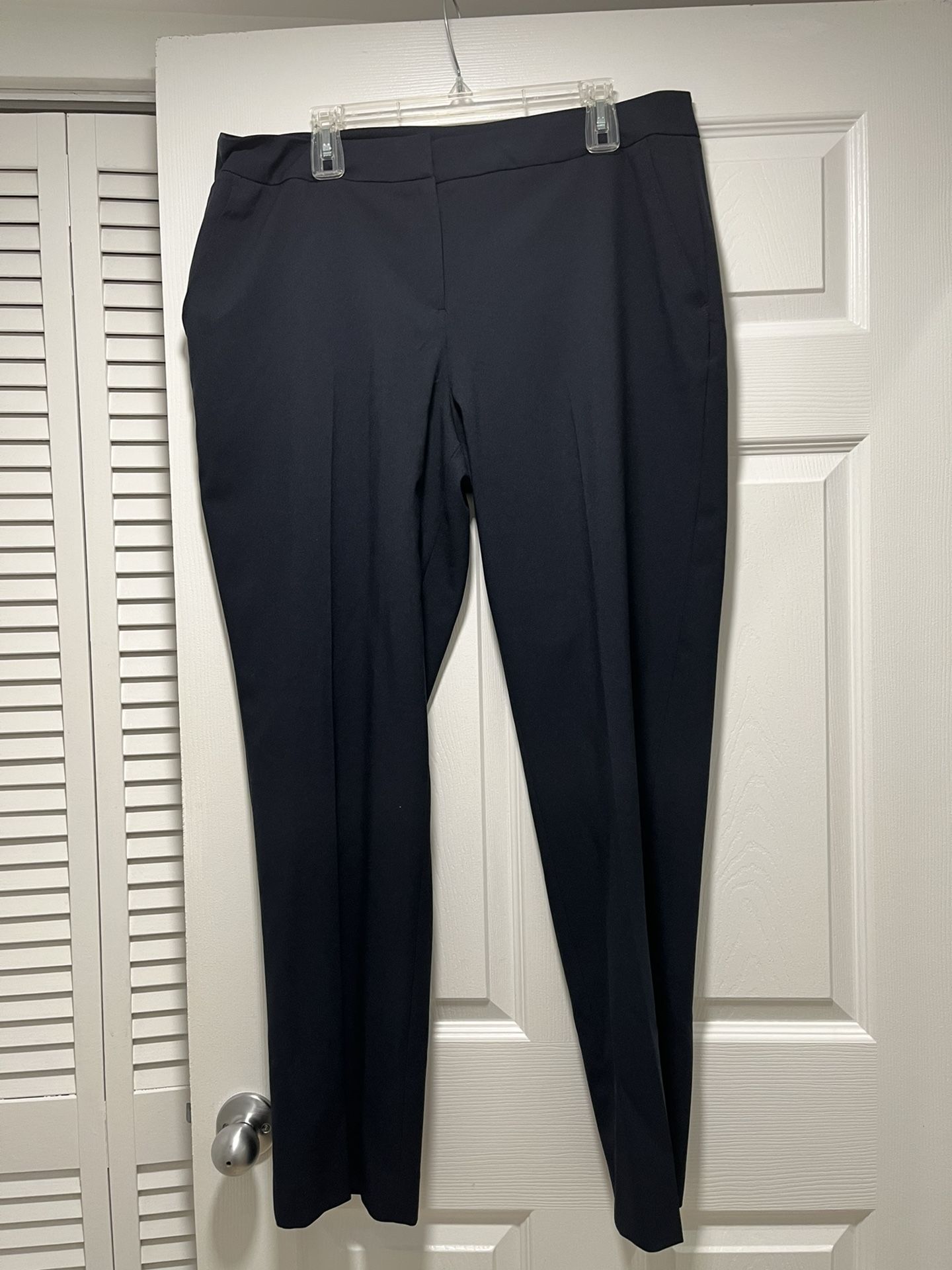 Black dress pants with side pockets, size 16,