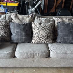 $100 - Wide 3 Seater Ashley Couch With Extra Washable Pillow Cases